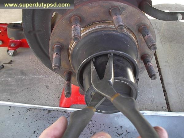 Ford F250 outer hub. 12) Remove the snap ring and thrust washers from the 